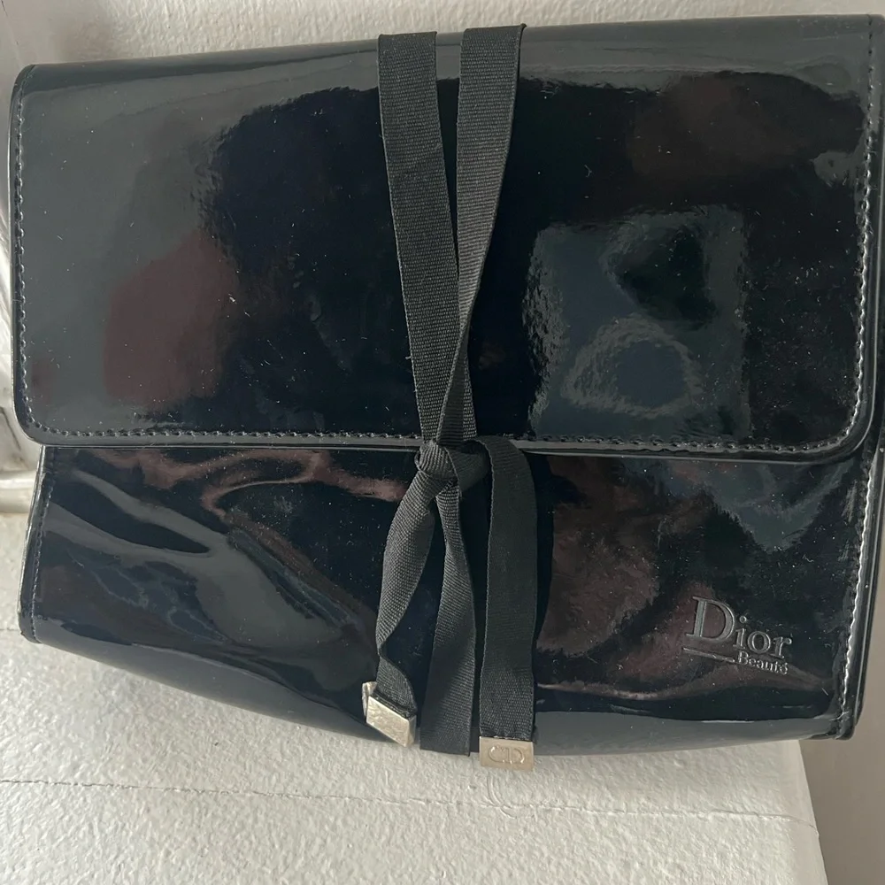 Dior Glossy Black Makeup Bag with Ribbon Detail.